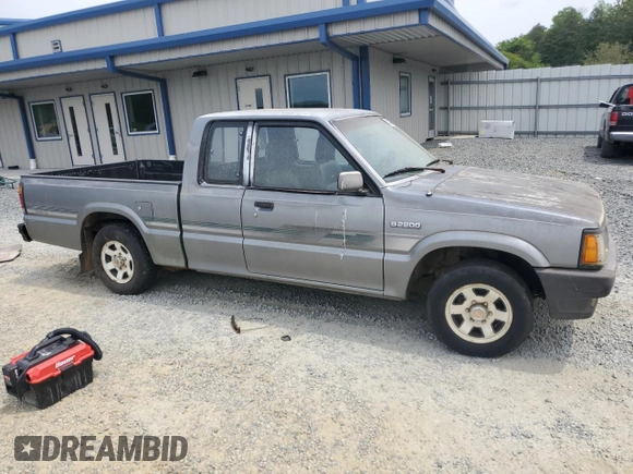 1992 Mazda B-Series Truck with VIN JM2UF3137N0287091, listed as a Copart auction lot 54333985 with 217,747 mi miles and Clean Title. Bid and sale history available at DreamBid. Image 4.