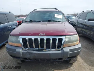 2001 Jeep Grand Cherokee Laredo with VIN 1J4GW48S51C739725, listed as a IAAI auction lot 41800431 with 220,396 mi miles. Bid and sale history available at carsss.com. Image 12.
