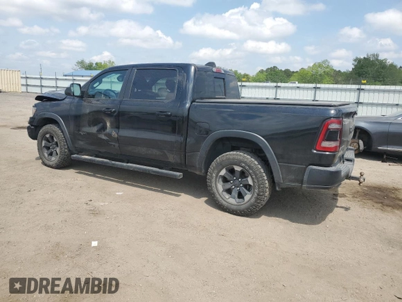 2019 Ram 1500 Rebel z VIN 1C6SRFLT8KN618140, wystawiony jako Copart lot #54734815 z przebiegiem 145 040 mil mil oraz Szkoda całkowita • Salvage title. Historia ofert i sprzedaży dostępna na DreamBid. Obrazek 2.