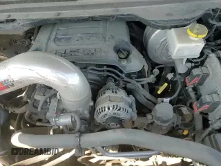 2020 Ram 1500 Rebel z VIN 1C6SRFLT0LN233317, wystawiony jako Copart lot #70363135 z przebiegiem 124 850 mil mil oraz Szkoda całkowita • Salvage title. Historia ofert i sprzedaży dostępna na DreamBid. Obrazek 13.