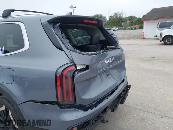 2023 Kia Telluride EX with VIN 5XYP34GC7PG356057, listed as a IAAI auction lot 41475968 with 37,832 mi miles and . Bid and sale history available at DreamBid. Image 6.
