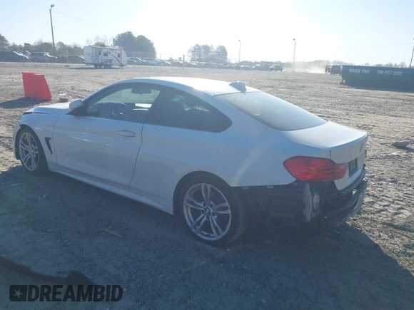2014 BMW 4 Series 428i with VIN WBA3N3C53EF712057, listed as a IAAI auction lot 41868781 with 133,834 mi miles and . Bid and sale history available at DreamBid. Image 3.