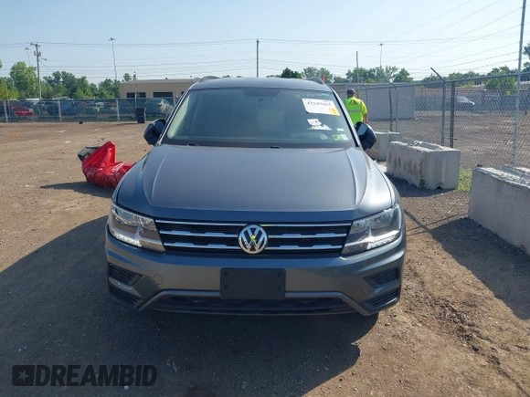 2021 Volkswagen Tiguan S with VIN 3VV0B7AX3MM038342, listed as a IAAI auction lot 42545665 with 66,809 mi miles and . Bid and sale history available at DreamBid. Image 13.