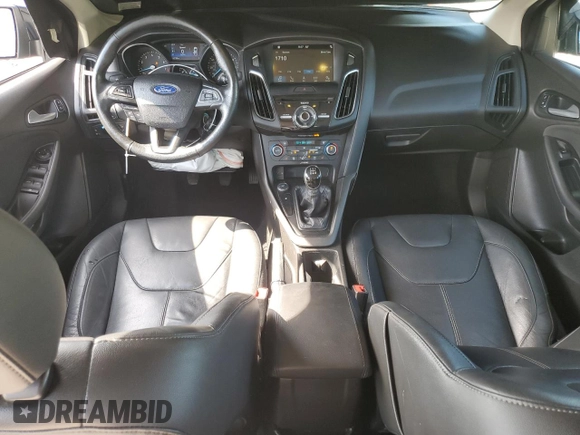 2016 Ford Focus SE with VIN 1FADP3F21GL228871, listed as a Copart auction lot 63506525 with 62,756 mi miles and Salvage title. Bid and sale history available at DreamBid. Image 8.