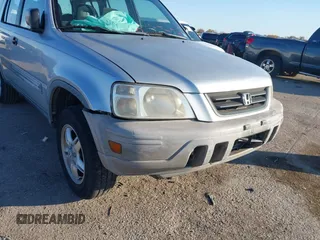 1999 Honda CR-V LX with VIN JHLRD284XXC019021, listed as a IAAI auction lot 41031098 with 204,206 mi miles. Bid and sale history available at carsss.com. Image 6.