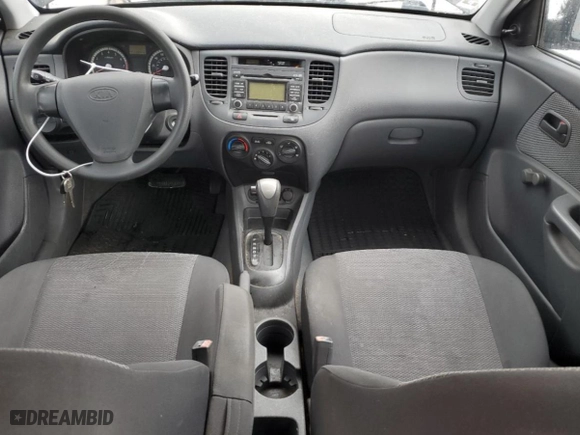 2009 Kia Rio with VIN KNADE223196446784, listed as a Copart auction lot 51796215 with 115442 miles and Clean Title. Bid and sale history available at carsss.com. Image 8.
