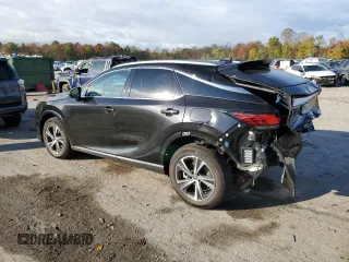 2023 Lexus RX with VIN 2T2BAMCA2PC013409, listed as a Copart auction lot 71721004 with 10,615 mi miles and Salvage Title. Bid and sale history available at carsss.com. Image 2.