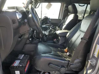 2015 Jeep Wrangler Unlimited Wrangler X with VIN 1C4BJWEG7FL580885, listed as a Copart auction lot 48891605 with 104,448 mi miles and Salvage title. Bid and sale history available at DreamBid. Image 7.