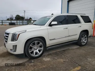 2015 Cadillac Escalade Premium z VIN 1GYS4CKJ2FR283990, wystawiony jako Copart lot #51136645 z przebiegiem 196 071 mil mil oraz Tytuł czysty. Historia ofert i sprzedaży dostępna na DreamBid. Obrazek 1.