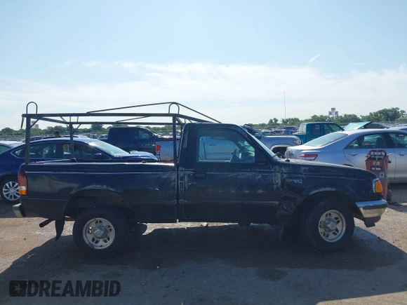1997 Ford Ranger XLT z VIN 1FTCR10A4VTA44803, wystawiony jako IAAI lot #42479081 z przebiegiem 162 346 mil mil oraz . Historia ofert i sprzedaży dostępna na DreamBid. Obrazek 13.