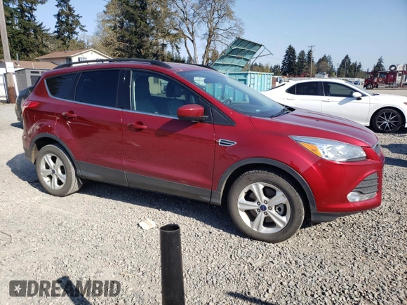 2016 Ford Escape SE with VIN 1FMCU9G91GUA85357, listed as a Copart auction lot 53902925 with 30,177 mi miles and Salvage Title. Bid and sale history available at DreamBid. Image 4.