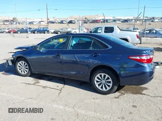 2015 Toyota Camry XLE with VIN 4T4BF1FK3FR505961, listed as a IAAI auction lot 41042038 with Not Provided miles and . Bid and sale history available at carsss.com. Image 13.