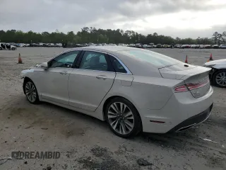 2019 Lincoln MKZ Hybrid Reserve II with VIN 3LN6L5MU9KR633669, listed as a Copart auction lot 51943355 with 98,581 mi miles and Salvage title. Bid and sale history available at DreamBid. Image 2.
