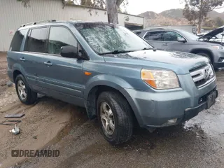 2007 Honda Pilot EX with VIN 2HKYF18437H528868, listed as a IAAI auction lot 41762030 with 203,212 mi miles. Bid and sale history available at carsss.com. Image 1.