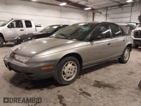 1997 Saturn SL with VIN 1G8ZH5280VZ172929, listed as a IAAI auction lot 41273214 with 134,972 mi miles. Bid and sale history available at carsss.com. Image 20.