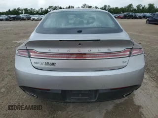 2016 Lincoln MKZ z VIN 3LN6L2GK3GR623560, wystawiony jako Copart lot #55337905 z przebiegiem 167 403 mil mil oraz Szkoda całkowita • Salvage title. Historia ofert i sprzedaży dostępna na DreamBid. Obrazek 6.