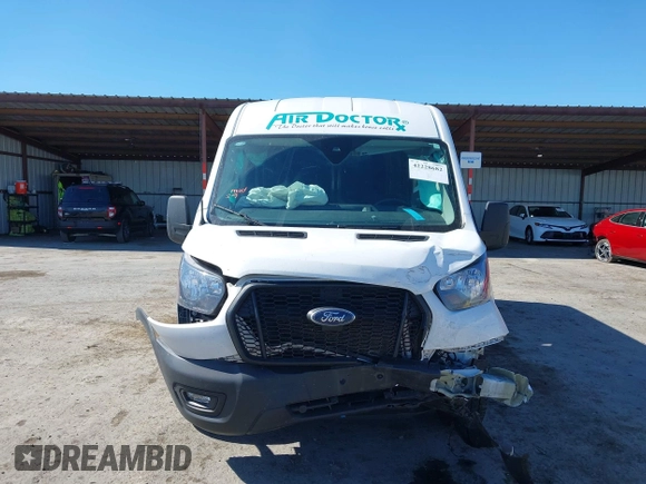 2023 Ford Transit Cargo with VIN 1FTBR1C89PKC07197, listed as a IAAI auction lot 42228682 with 39,306 mi miles and . Bid and sale history available at DreamBid. Image 12.