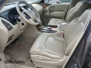 2011 Infiniti QX56 7-passenger with VIN JN8AZ2NE4B9006915, listed as a Copart auction lot 61909295 with 157,700 mi miles and Clean title. Bid and sale history available at DreamBid. Image 7.