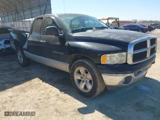 2005 Dodge Ram 1500 SLT with VIN 1D7HA18NX5S243967, listed as a IAAI auction lot 41669599 with 299,089 mi miles. Bid and sale history available at carsss.com. Image 1.