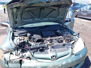 2004 Honda Civic LX z VIN 2HGES15554H591164, wystawiony jako IAAI lot #42289863 z przebiegiem 200 500 mil mil oraz . Historia ofert i sprzedaży dostępna na DreamBid. Obrazek 10.