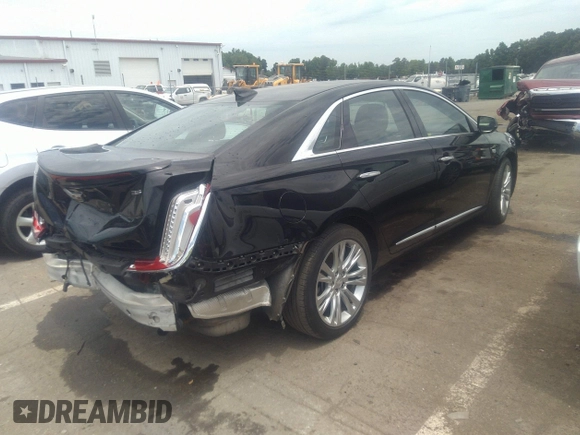 2019 Cadillac XTS Luxury with VIN 2G61M5S30K9131129, listed as a IAAI auction lot 33247508 with 89,208 mi miles and . Bid and sale history available at DreamBid. Image 4.