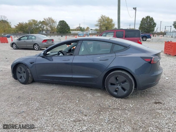 2023 Tesla Model 3 with VIN 5YJ3E1EA3PF699724, listed as a IAAI auction lot 40654814 with 1 mi miles. Bid and sale history available at carsss.com. Image 13.