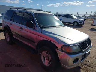 2001 Mitsubishi Montero ES z VIN JA4LS21HX1P041052, wystawiony jako IAAI lot #42084599 z przebiegiem 239 095 mil mil oraz . Historia ofert i sprzedaży dostępna na DreamBid. Obrazek 1.