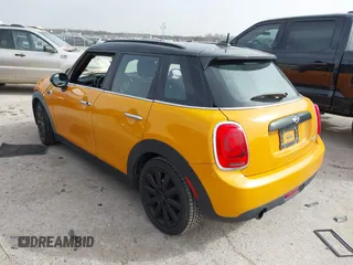 2016 MINI Hardtop 4 Door z VIN WMWXU1C56G2D10006, wystawiony jako IAAI lot #41752731 z przebiegiem 67 844 mil mil oraz . Historia ofert i sprzedaży dostępna na DreamBid. Obrazek 3.