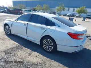 2020 Honda Accord Touring with VIN 1HGCV3F99LA008992, listed as a IAAI auction lot 41411311 with 93,936 mi miles and . Bid and sale history available at DreamBid. Image 3.