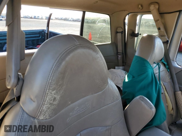 2000 Ford F-150 XL with VIN 1FTRX17W4YNB17453, listed as a Copart auction lot 52051215 with Not provided miles and Salvage title. Bid and sale history available at DreamBid. Image 10.