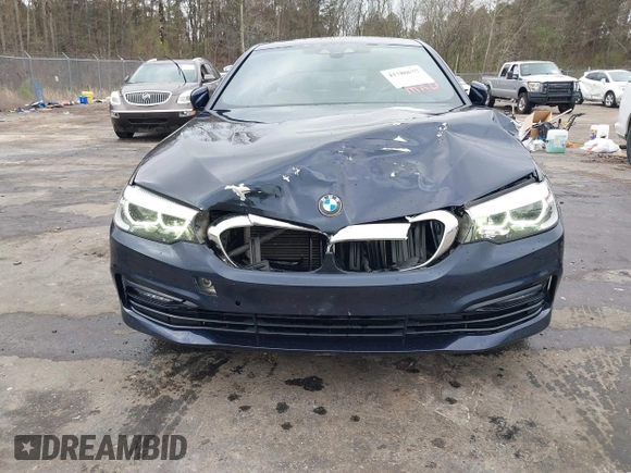 2018 BMW 5 Series 530i with VIN WBAJA5C55JWA39526, listed as a IAAI auction lot 41780637 with 121,693 mi miles and . Bid and sale history available at DreamBid. Image 6.