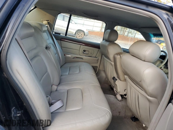 1999 Cadillac DeVille z VIN 1G6KD54Y5XU767438, wystawiony jako Copart lot #86133764 z przebiegiem Nie podano mil oraz Nie do naprawy • Non repairable. Historia ofert i sprzedaży dostępna na DreamBid. Obrazek 11.