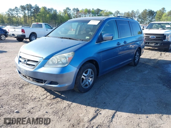2005 Honda Odyssey EX-L with VIN 5FNRL38605B037065, listed as a IAAI auction lot 42042666 with 228,908 mi miles. Bid and sale history available at carsss.com. Image 2.
