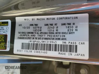 2021 Mazda 3 Premium with VIN JM1BPADL9M1319945, listed as a Copart auction lot 52902425 with 74,221 mi miles and Salvage title. Bid and sale history available at DreamBid. Image 12.