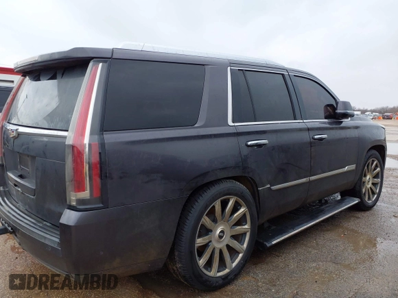 2015 Cadillac Escalade Premium z VIN 1GYS3NKJ5FR540221, wystawiony jako IAAI lot #41289989 z przebiegiem 100 191 mil mil oraz . Historia ofert i sprzedaży dostępna na DreamBid. Obrazek 13.