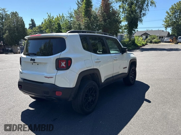 2017 Jeep Renegade Trailhawk with VIN ZACCJBCB6HPE79727, listed as a Copart auction lot 64074965 with 90,651 mi miles and Salvage title. Bid and sale history available at DreamBid. Image 4.