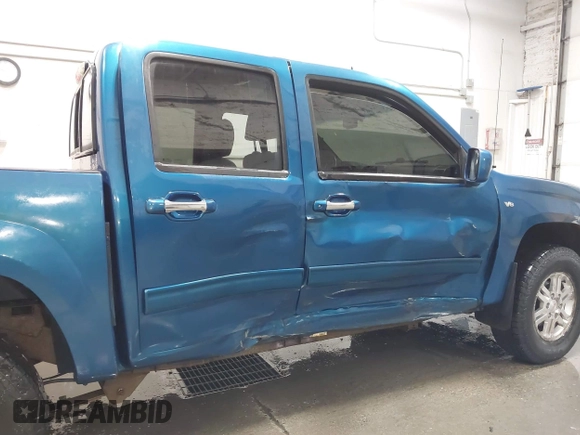 2011 GMC Canyon SLT with VIN 1GTH6NFP8B8115436, listed as a IAAI auction lot 41676023 with 148,478 mi miles. Bid and sale history available at carsss.com. Image 6.