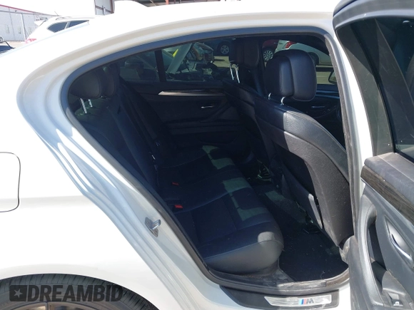 2013 BMW 5 Series 528i with VIN WBAXG5C56DD230121, listed as a IAAI auction lot 42019899 with 142,100 mi miles and . Bid and sale history available at carsss.com. Image 8.
