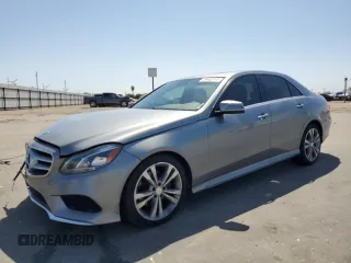 2015 Mercedes-Benz E 350 Luxury with VIN WDDHF8JB4FB115235, listed as a Copart auction lot 59403195 with 154,251 mi miles and Salvage title. Bid and sale history available at DreamBid. Image 1.