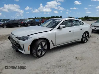 2023 BMW i4 eDrive40 z VIN WBY73AW02PFP79569, wystawiony jako Copart lot #70741883 z przebiegiem 9 396 mil mil oraz . Historia ofert i sprzedaży dostępna na DreamBid. Obrazek 1.