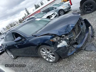 2015 Mazda 6 i Touring with VIN JM1GJ1V52F1185998, listed as a IAAI auction lot 41921373 with 101,306 mi miles and . Bid and sale history available at DreamBid. Image 14.