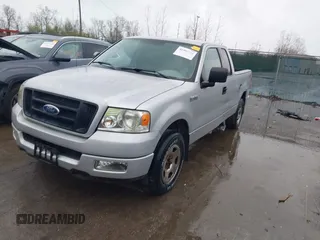 2005 Ford F-150 STX with VIN 1FTRX12W55FB28555, listed as a IAAI auction lot 41985722 with 87,833 mi miles. Bid and sale history available at carsss.com. Image 2.