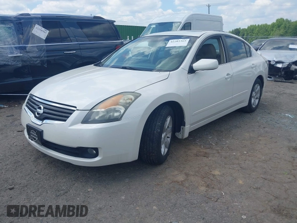 2009 Nissan Altima S z VIN 1N4AL21E39N471549, wystawiony jako IAAI lot #42203365 z przebiegiem 197 775 mil mil oraz . Historia ofert i sprzedaży dostępna na DreamBid. Obrazek 2.