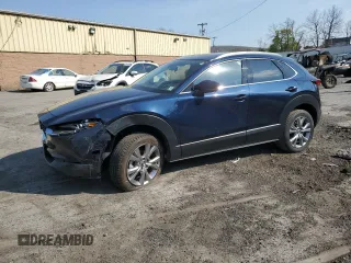 2022 Mazda CX-30 S Premium with VIN 3MVDMBDL3NM404404, listed as a Copart auction lot 54438705 with 41,311 mi miles and Salvage title. Bid and sale history available at DreamBid. Image 1.