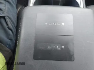 2023 Tesla Model Y Long Range with VIN 7SAYGDEE2PF765395, listed as a IAAI auction lot 41688080 with 27,792 mi miles and . Bid and sale history available at DreamBid. Image 11.