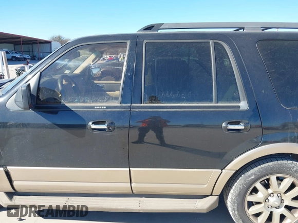 2011 Ford Expedition XLT with VIN 1FMJU1H55BEF25877, listed as a IAAI auction lot 41403624 with 198,558 mi miles and . Bid and sale history available at DreamBid. Image 15.