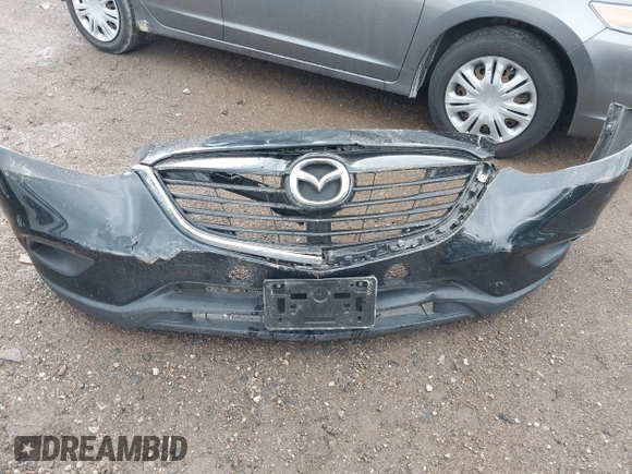 2015 Mazda CX-9 Sport with VIN JM3TB3BV1F0466070, listed as a IAAI auction lot 42350686 with 110,818 mi miles and . Bid and sale history available at DreamBid. Image 12.