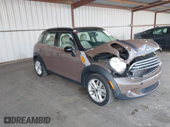 2012 MINI Countryman with VIN WMWZB3C51CWM04563, listed as a IAAI auction lot 42564564 with 95,760 mi miles and . Bid and sale history available at DreamBid. Image 1.