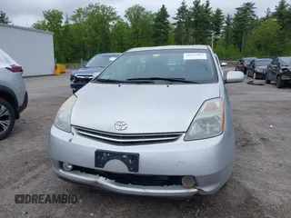 2006 Toyota Prius z VIN JTDKB20U967074471, wystawiony jako IAAI lot #42332013 z przebiegiem 303 162 mil mil oraz . Historia ofert i sprzedaży dostępna na DreamBid. Obrazek 6.