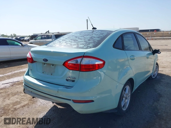 2017 Ford Fiesta SE with VIN 3FADP4BJ7HM150339, listed as a IAAI auction lot 42007084 with 109,334 mi miles. Bid and sale history available at carsss.com. Image 4.
